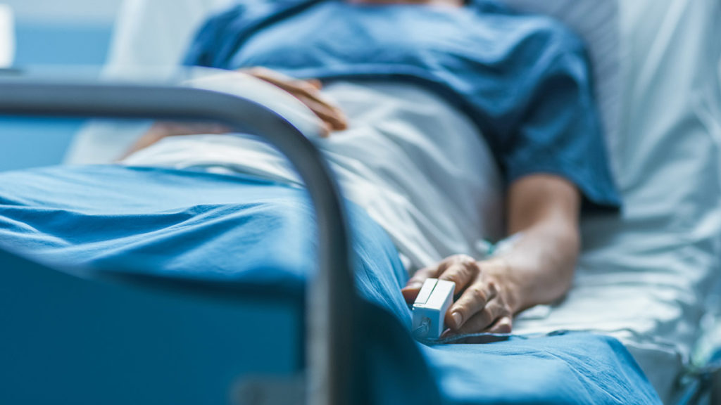 patient in hospital bed for Partial Hospitalization for Addiction Treatment