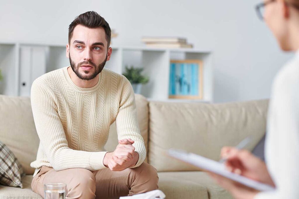 a therapist gives healthy dating tips to a patient