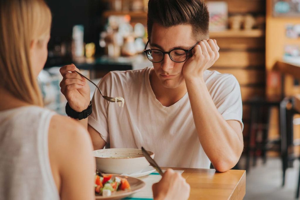 man suffering from an eating disorder