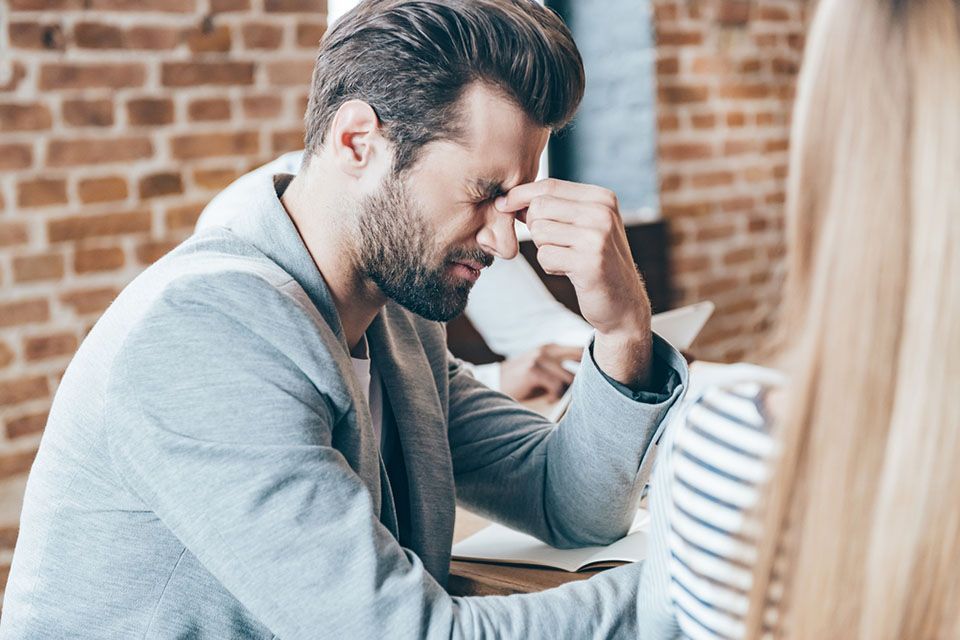 man getting irritated by girlfriend