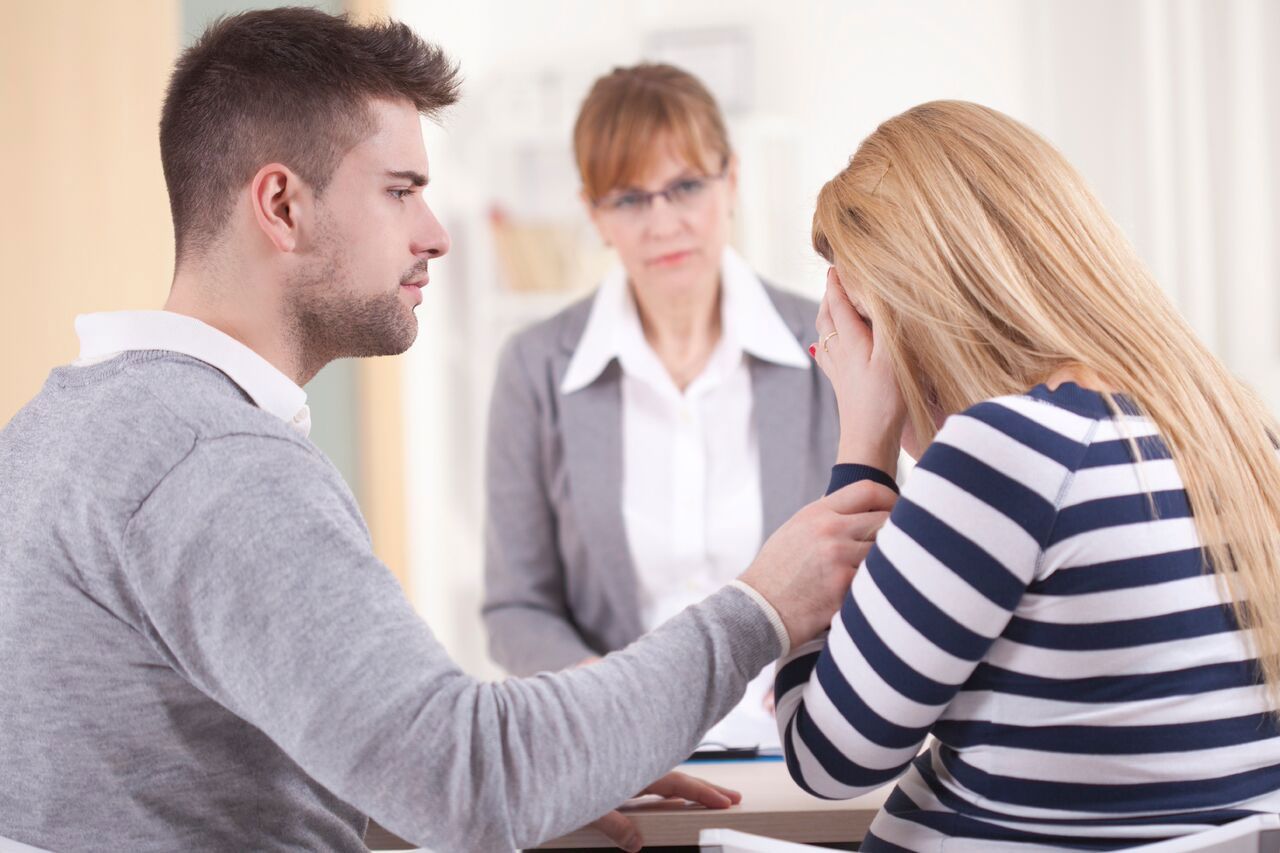 man and women in psychologist office