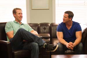 two men talking to each other