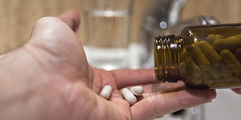 hand holding pills