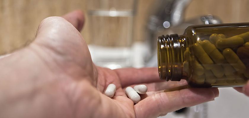 hand holding pills