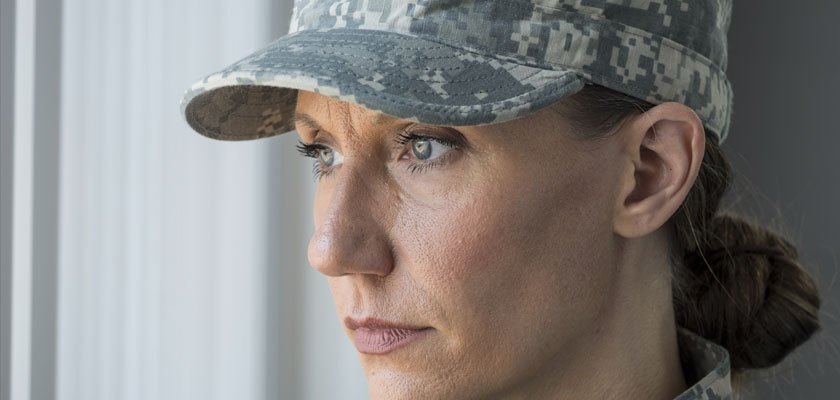 female soldier looking out