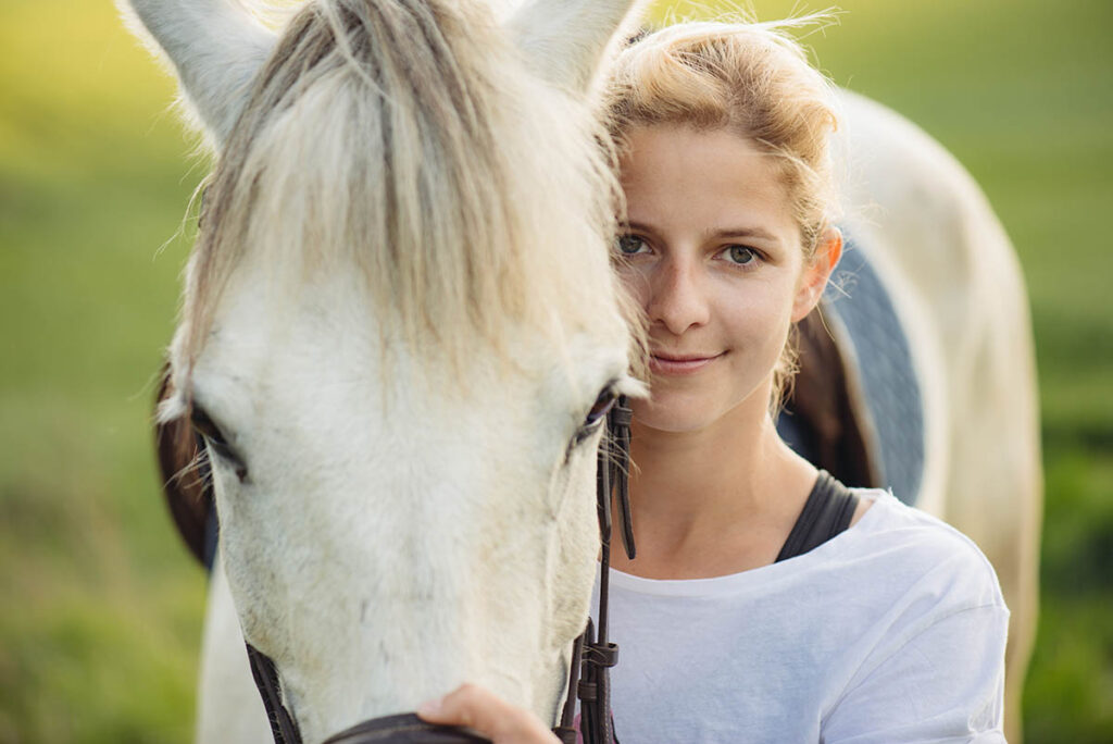 Woman and horses for addiction recovery