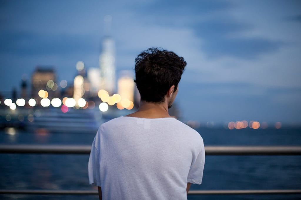 man looking out to a harbor wondering Is borderline personality disorder a disability