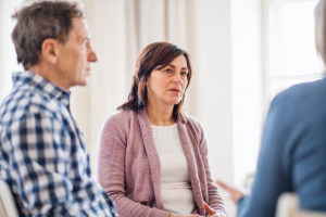 a group discussing an anger management therapy program