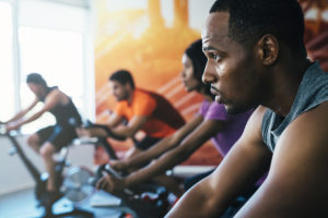 a group participates in an exercise therapy program