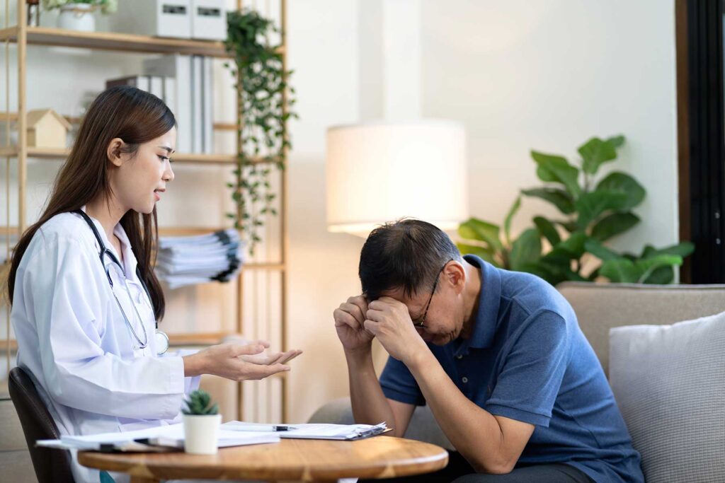 Counselor providing a distressed client with an answer to the question what is individual therapy