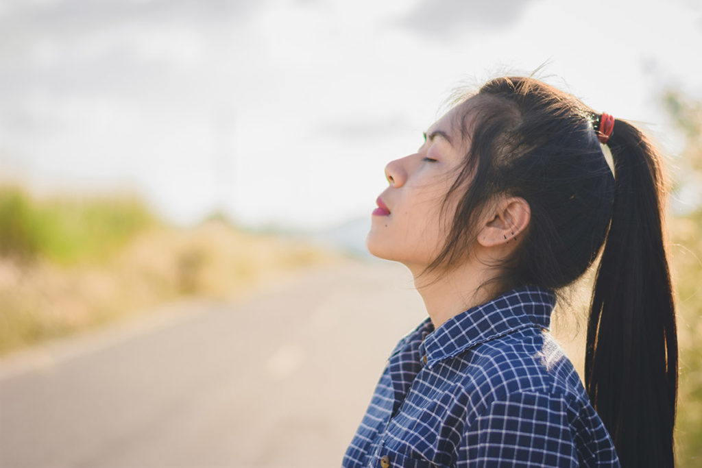 woman outside knowing how to prevent a panic attack