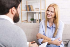 patient happily being told what is psychotherapy