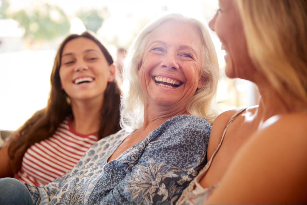 Grandmother talking with teens about drugs and alcohol and the harm of addiction