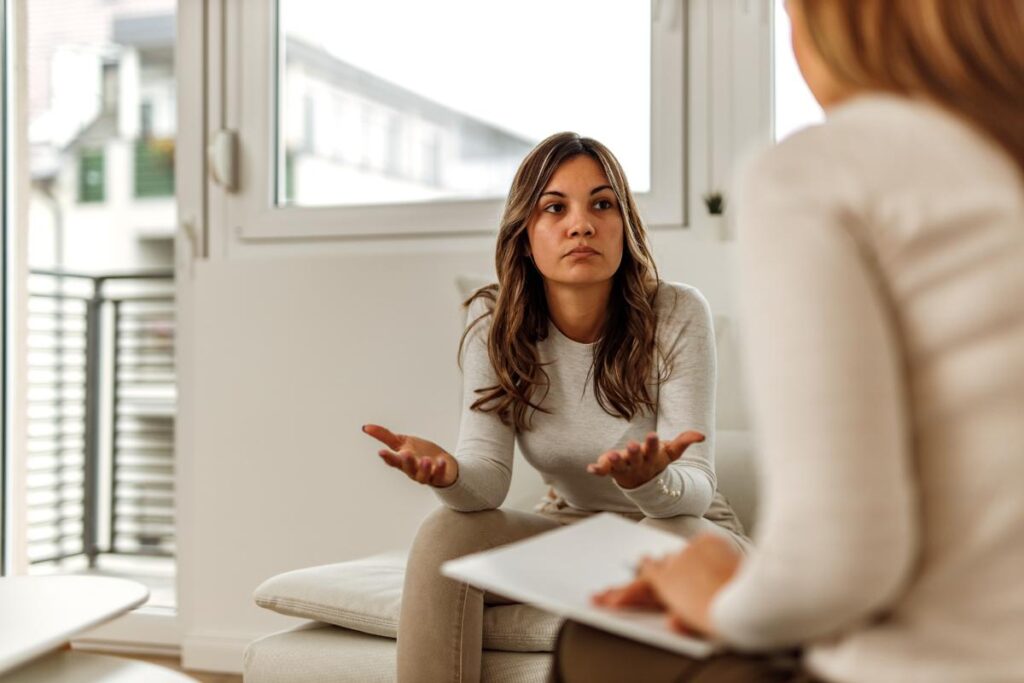 person in counseling learning about bipolar II disorder symptoms and how to manage them