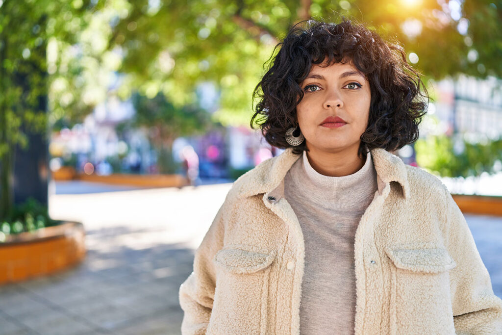 A woman thinking about the signs of postpartum depression