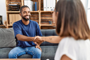 people shaking hands at one of many dual diagnosis treatment centers in tennessee