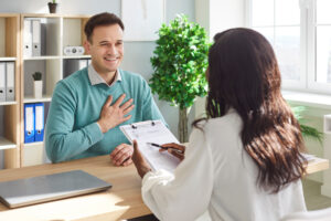 Man checking in with medical professional